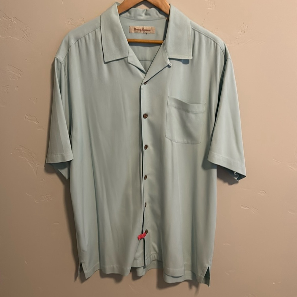 Tommy bahama silk camp shirt and a light turquoise blue. Size large. EUC